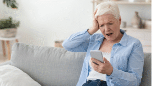 distressed older woman online safety